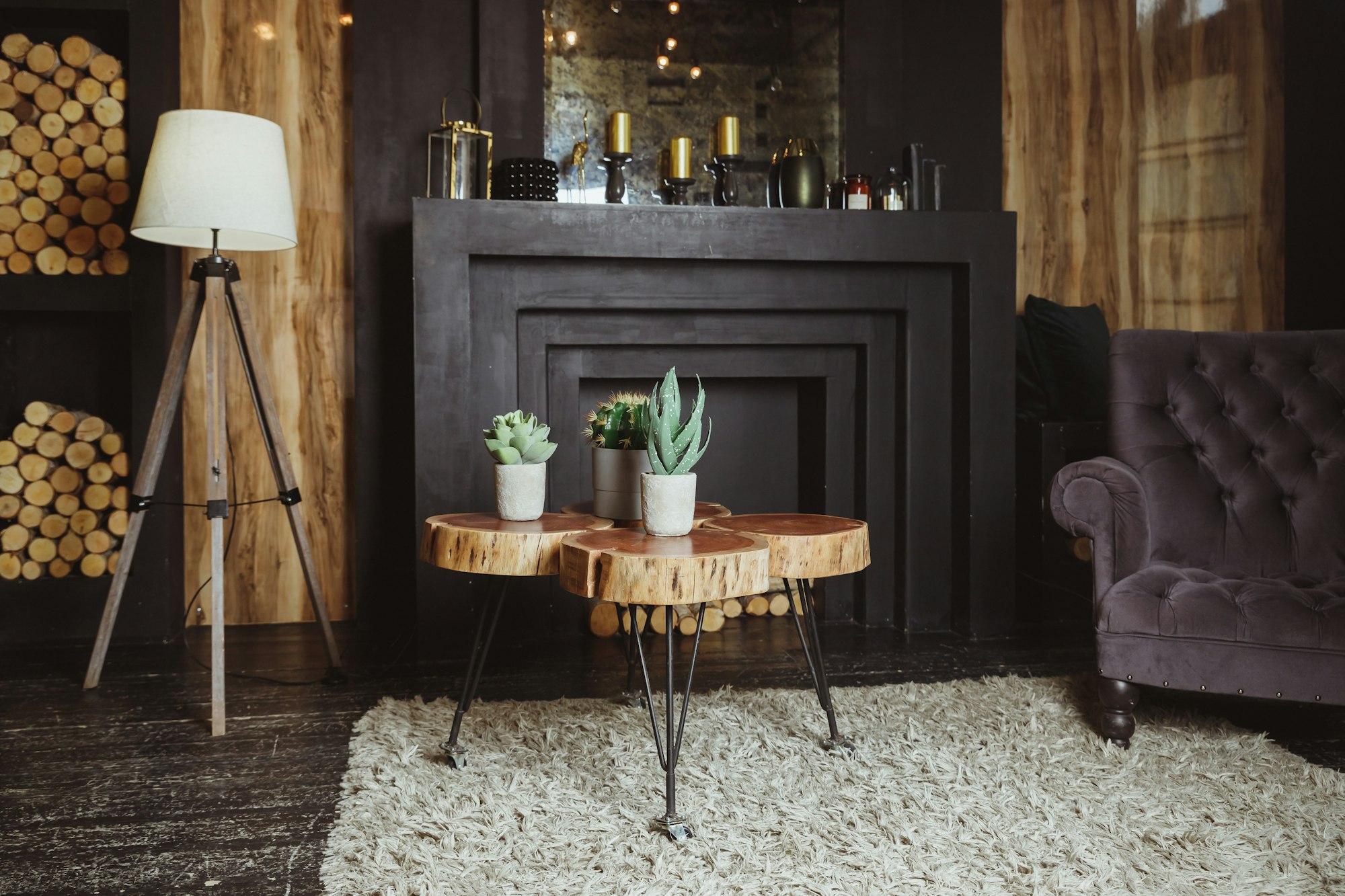 Stylish scandinavian composition of living room with design armchair, floor lamp, plants, wooden